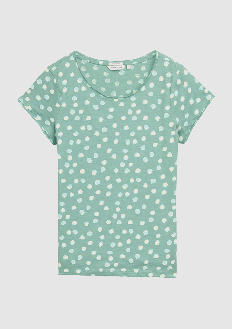 Baumwoll-T-Shirt in Grün mit weißen Punkten und rundem Halsausschnitt. Baumwoll-T-Shirt in Grün mit weißen Punkten und rundem Halsausschnitt.